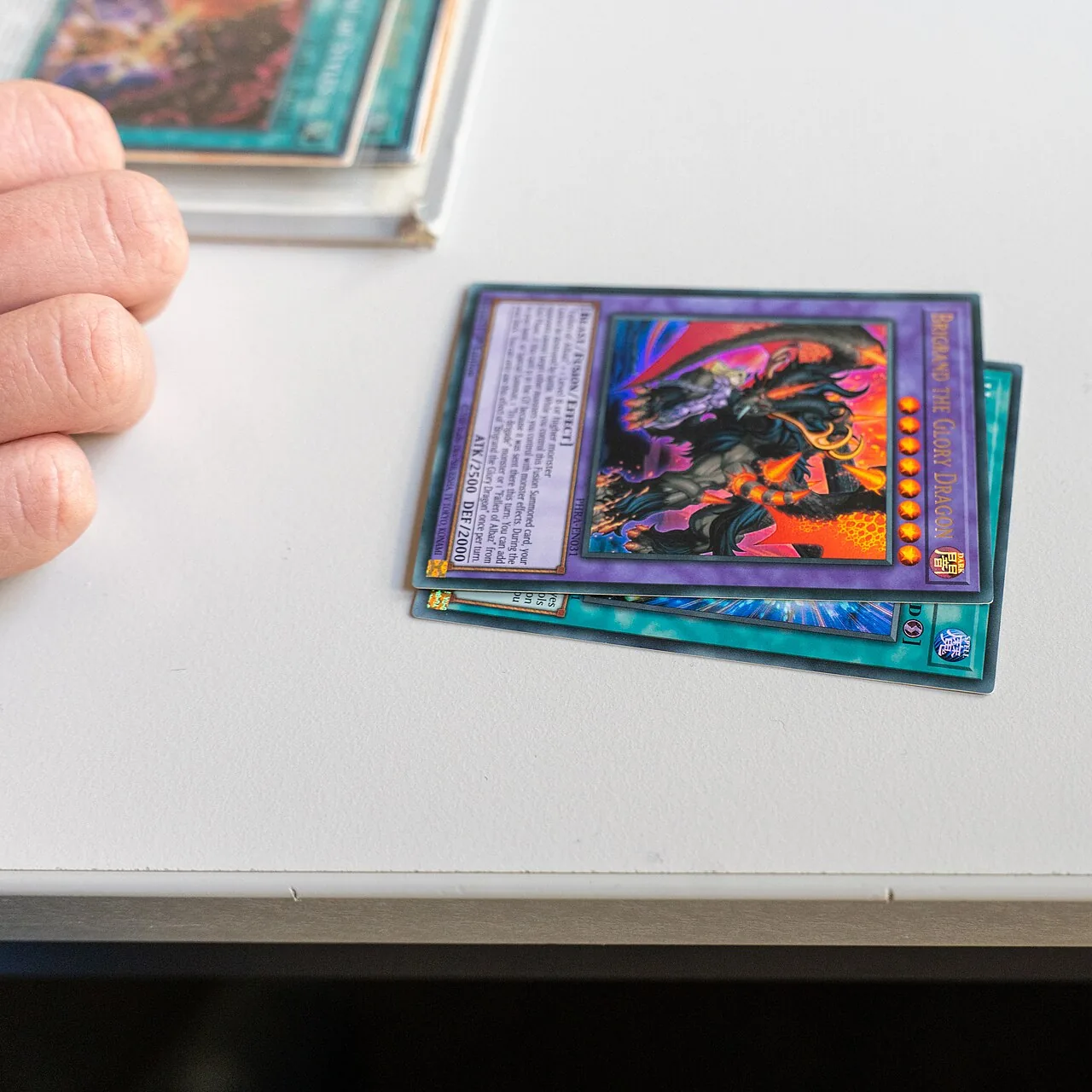 Two cards laid on a clean white table, ready to be checked